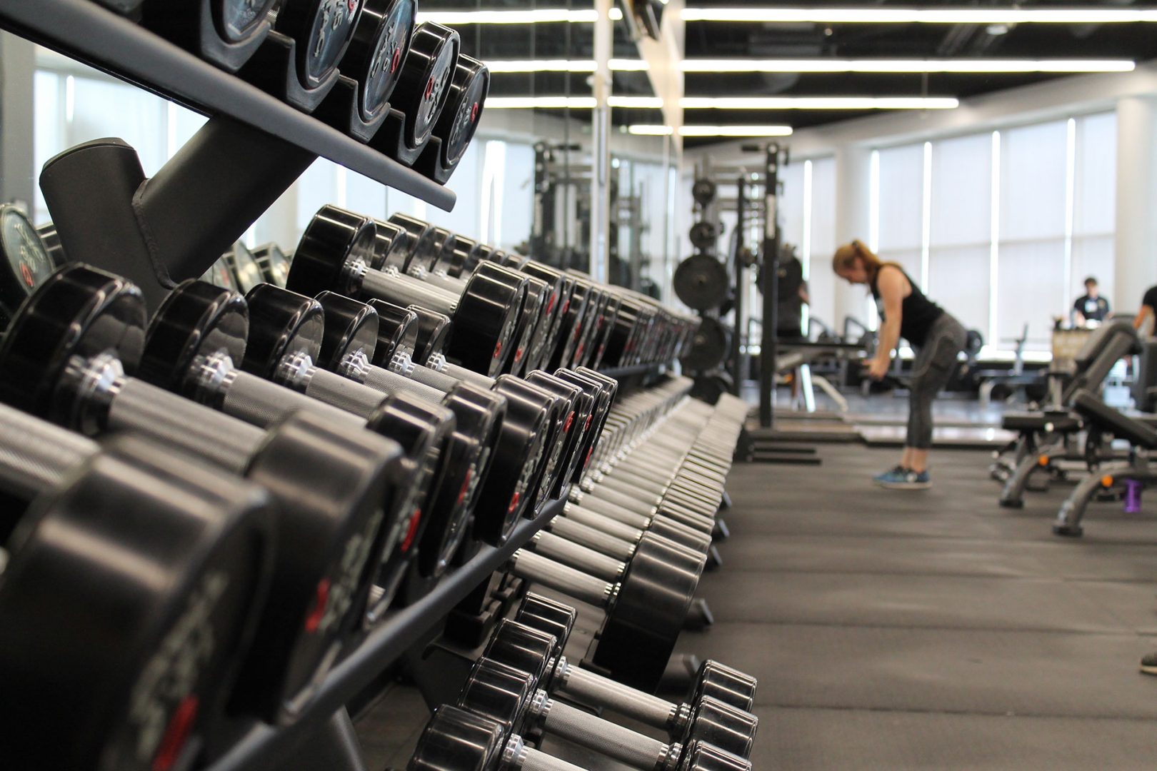 a woman in gym swarm