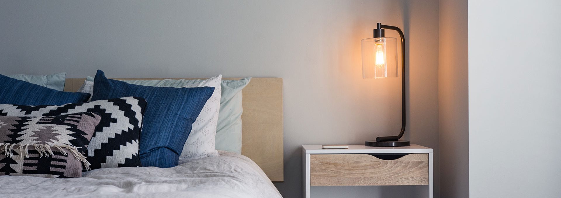 bed with side table and lamp swarm